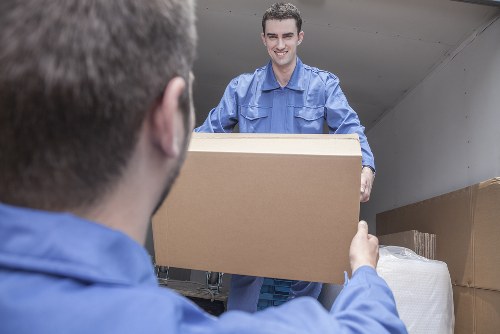 Man with van helping with furniture transport in Harlington