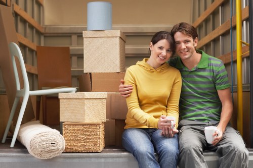 Packed boxes and furniture ready for house removals in Harlington