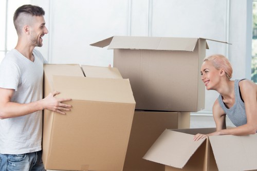 Household boxes and protective wrapping prepared for a Harlington relocation