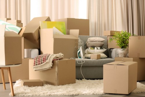 Office desks and boxes arranged for a smooth Harlington move