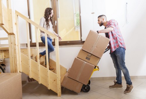 Commercial removals team relocating office equipment in Harlington