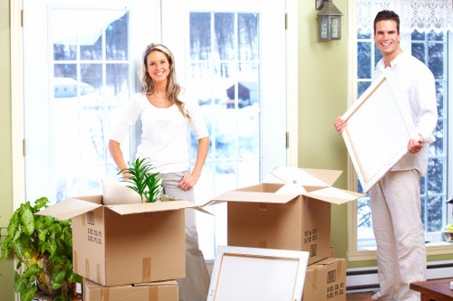 Organised storage unit with packed belongings in Harlington